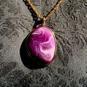 Acrylic Purple Swirl Pendant on a gold tone chain